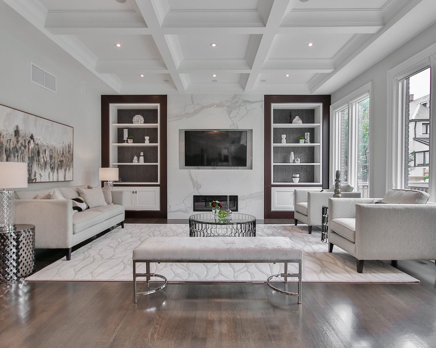 White living room with marble accent wall